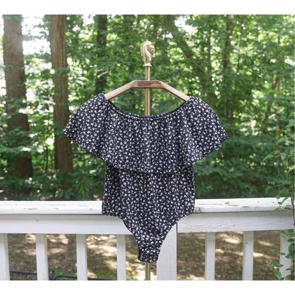 Vibe Sportswear Black White Floral Ruffle Bodysuit